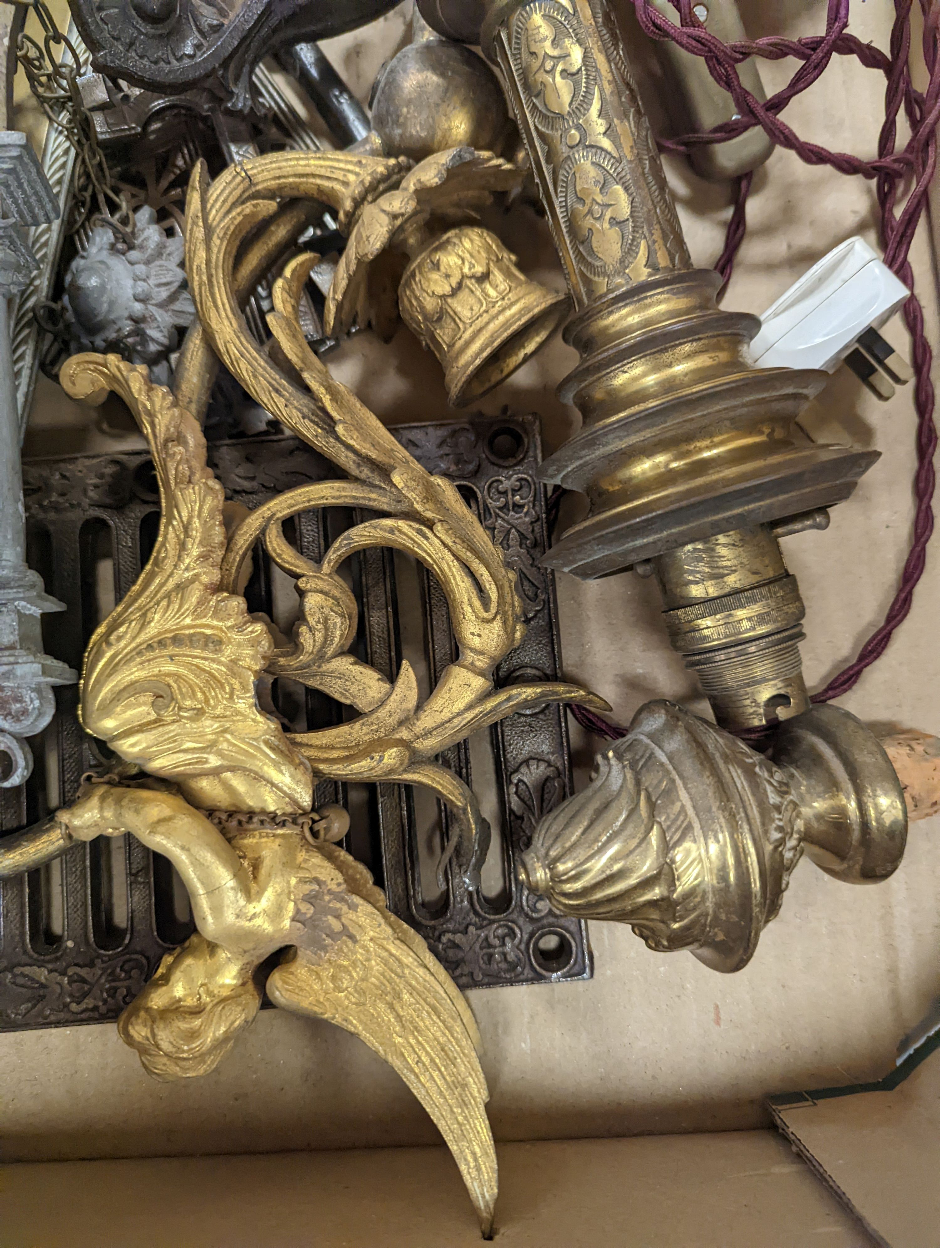 A brass oil lamp, a brass figure of an angel and mixed metalwares.